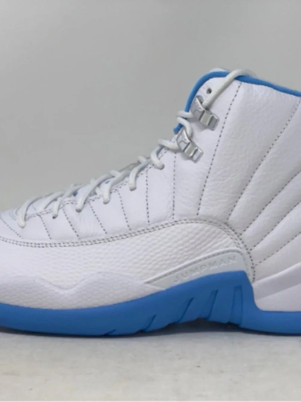 Air Jordan 12 'Melo UNC University Blue' White Sneakers